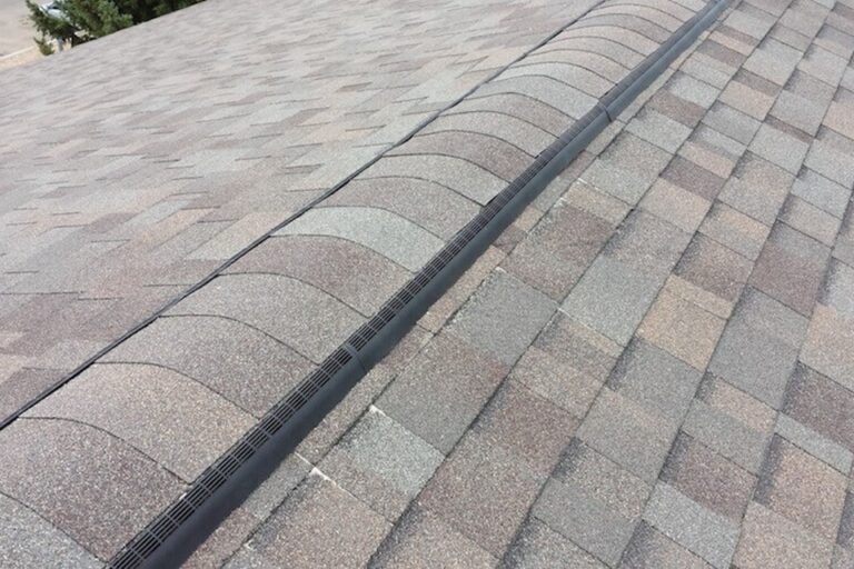 residential-asphalt-roof-replacement-skylight-valley-work-natural-wood-malarkey-roo-natural-wood-closeup
